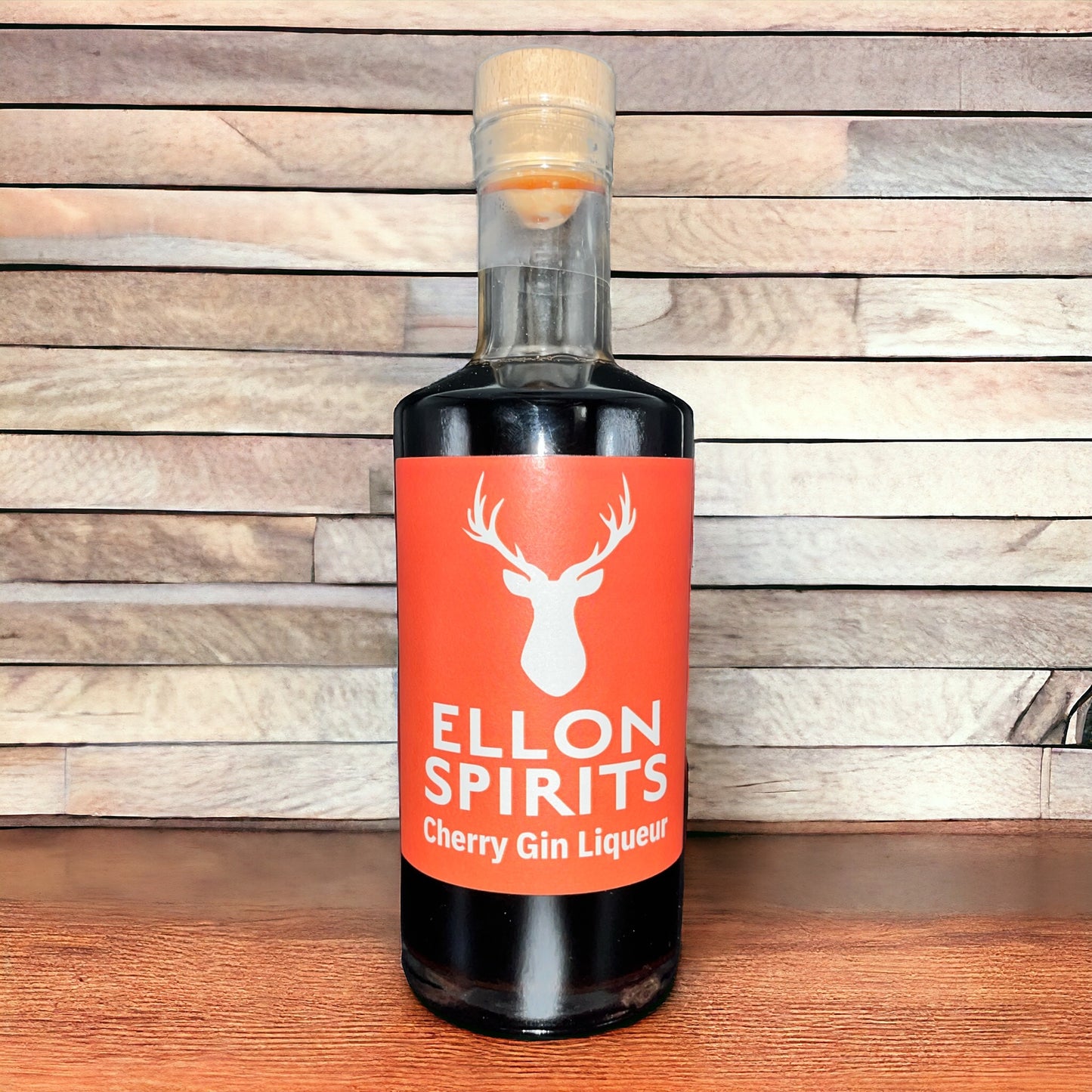 Ellon Spirits Cherry Gin Liqueur 500ml 20% ABV on wooden background 